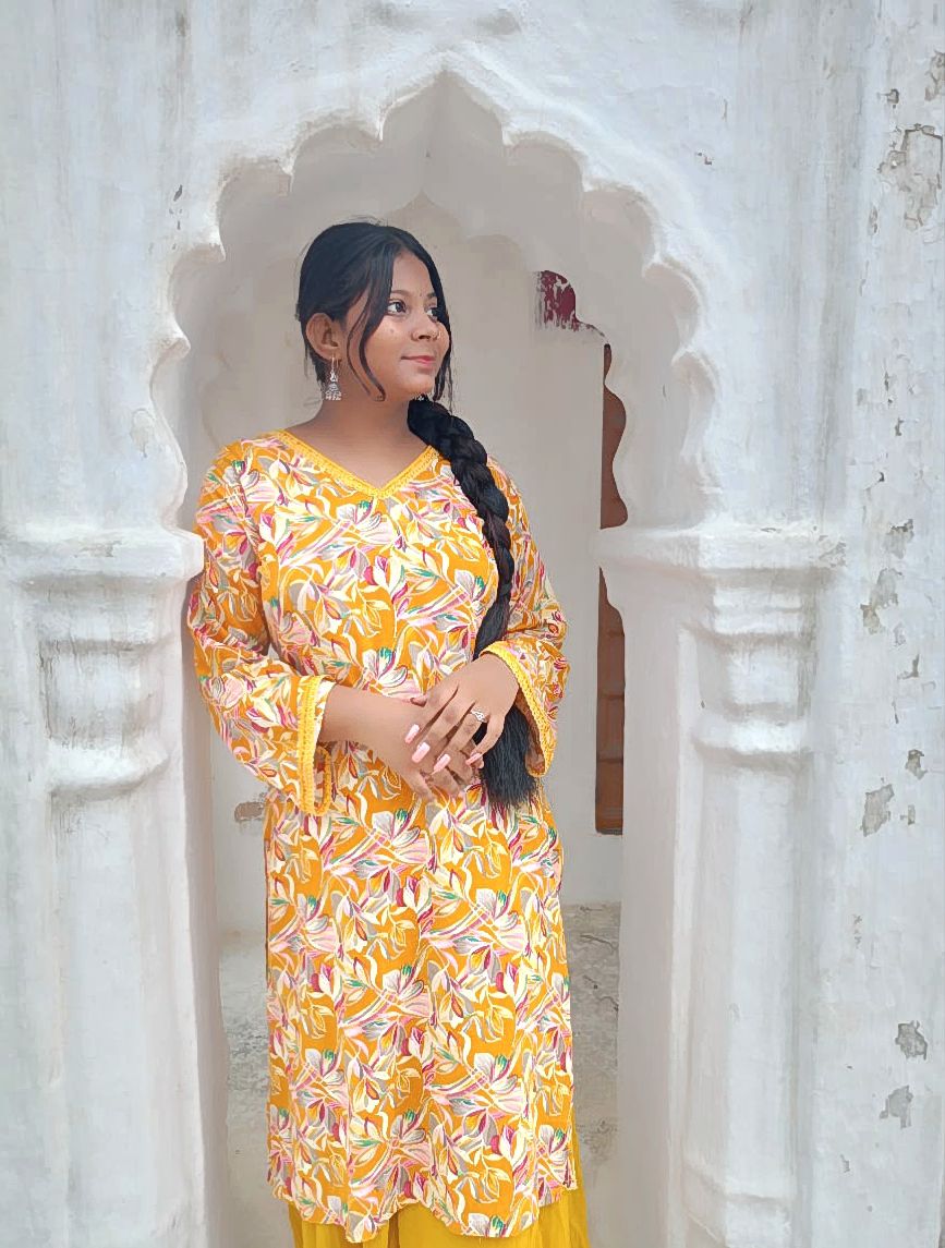 Basant Bahar - Yellow kurti with bell sleeves.