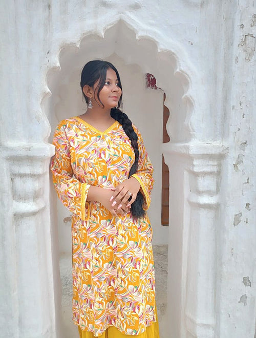 Basant Bahar - Yellow kurti with bell sleeves.