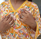 Basant Bahar - Yellow kurti with bell sleeves.