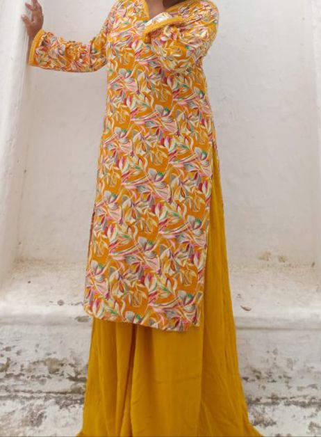 Basant Bahar - Yellow kurti with bell sleeves.